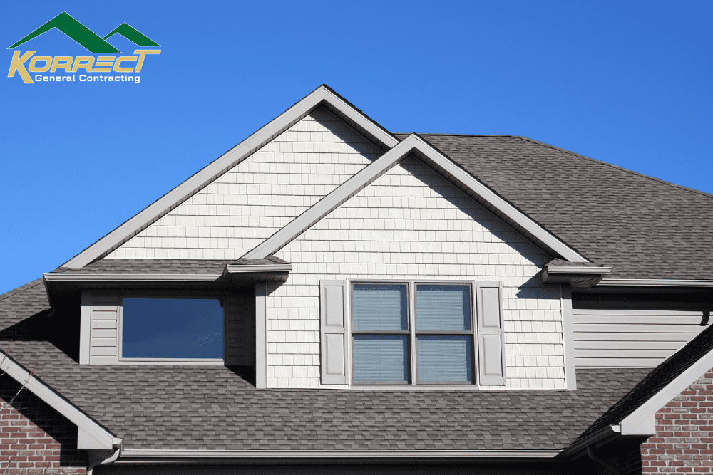 Close view of a updated gray shingle roof and gables on a DFW home installed by Korrect General Contracting.