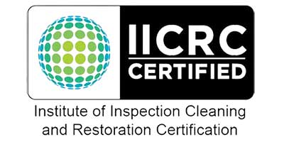 The image displays the IICRC Certified logo, featuring a globe design with green and blue dots, alongside the text “Institute of Inspection Cleaning and Restoration Certification,” relevant for Fort Worth roofing and restoration services.| Korrect General Contracting Fort Worth TX